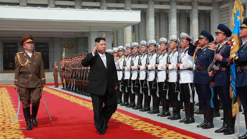 This April 15, 2017 picture released from North Korea's official Korean Central News Agency (KCNA) on April 16, 2017 shows North Korean leader Kim Jong-Un (C) arriving for a military parade in Pyongyang marking the 105th anniversary of the birth of late North Korean leader Kim Il-Sung. / AFP PHOTO / KCNA VIA KNS / STR / South Korea OUT / REPUBLIC OF KOREA OUT   ---EDITORS NOTE--- RESTRICTED TO EDITORIAL USE - MANDATORY CREDIT "AFP PHOTO/KCNA VIA KNS" - NO MARKETING NO ADVERTISING CAMPAIGNS - DISTRIBUTED AS A SERVICE TO CLIENTS
THIS PICTURE WAS MADE AVAILABLE BY A THIRD PARTY. AFP CAN NOT INDEPENDENTLY VERIFY THE AUTHENTICITY, LOCATION, DATE AND CONTENT OF THIS IMAGE. THIS PHOTO IS DISTRIBUTED EXACTLY AS RECEIVED BY AFP.  /         (Photo credit should read STR/AFP/Getty Images)