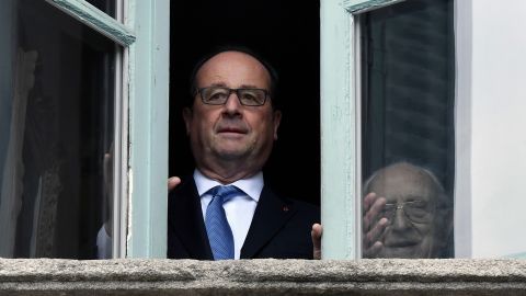 Outgoing French President Francois Hollande looks out of a window in Tulle, France on May 7. 