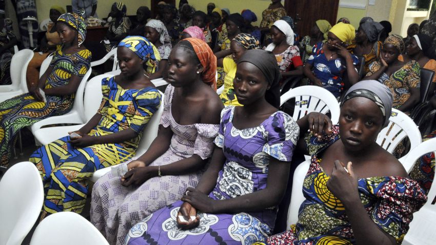 Chibok school girls recently freed from Boko Haram captivity are seen in Abuja, Nigeria, Sunday, May 7, The 82 freed Chibok schoolgirls arrived in Nigeria's capital on Sunday to meet President Muhammadu Buhari as anxious families awaited an official list of names and looked forward to reuniting three years after the mass abduction. 
