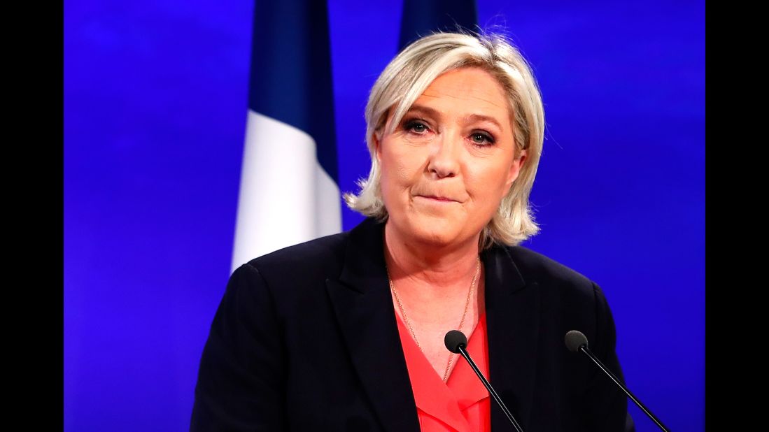 Marine Le Pen, candidate of the far-right Front National party,  delivers a speech in Paris on May 7 after losing to Macron.
