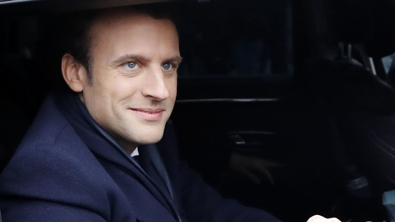 French presidential election candidate for the En Marche ! movement Emmanuel Macron leaves a polling station after casting his vote in Le Touquet, northern France, on May 7, 2017, during the second round of the French presidential election. / AFP PHOTO / Patrick KOVARIK        (Photo credit should read PATRICK KOVARIK/AFP/Getty Images)