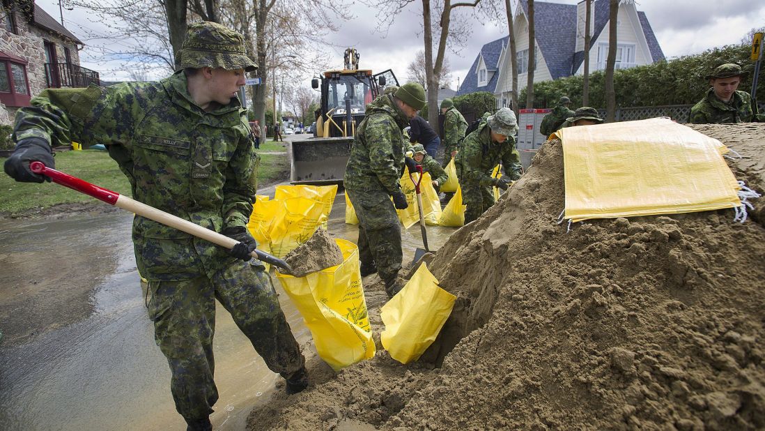 Members of the Canadian armed forces fill sandbags in Montreal on May 7.
