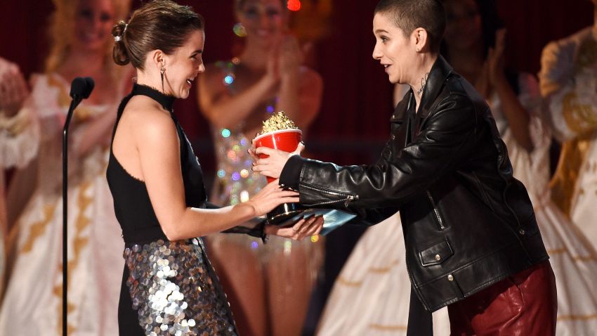 LOS ANGELES, CA - MAY 07:  Actor Emma Watson accepts the Best Actor in a Movie award for 'Beauty and the Beast' from actor Asia Kate Dillon onstage during the 2017 MTV Movie And TV Awards at The Shrine Auditorium on May 7, 2017 in Los Angeles, California.  (Photo by Kevork Djansezian/Getty Images)