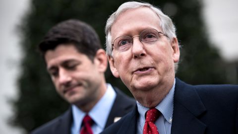 Speaker of the House Paul Ryan(L) R-WI listens while Senate Majority Leader Senator Mitch McConnell (R-KY) speaks February 27 in Washington, DC.