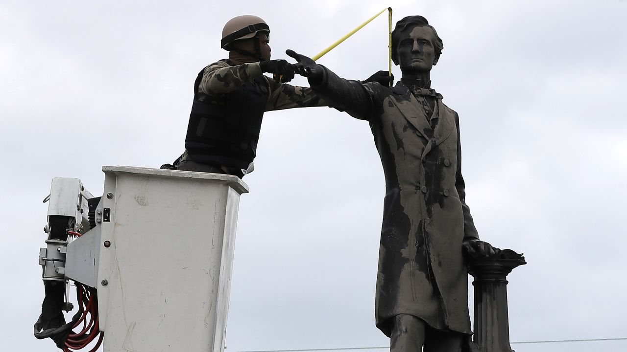 A statute of Confederate President Jefferson Davis came down in May in New Orleans.