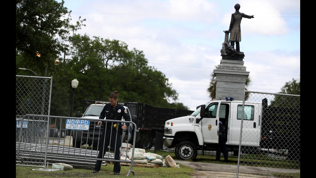 Barricades go up as the removal of a Jefferson Davis monument begins in May in New Orleans.