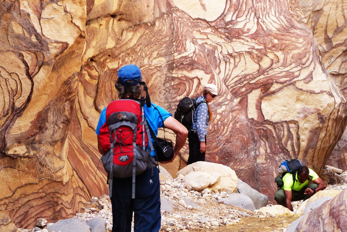 <strong>Into the landscape: </strong>Trekking through Petra offers walkers the chance to get close to the spectacular rock formations and colors.