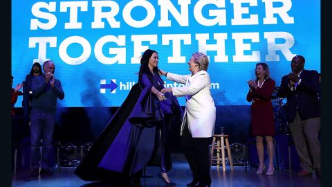 Democratic presidential nominee former Secretary of State Hillary Clinton (R) greets recording artist Katy Perry (L) during a get-out-the-vote concert at the Mann Center for the Performing Arts on November 5, 2016 in Philadelphia, Pennsylvania.