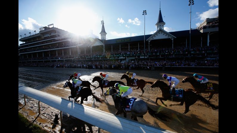 Horses head to the first turn at the start of <a href="index.php?page=&url=http%3A%2F%2Fwww.cnn.com%2F2017%2F05%2F06%2Fsport%2Fkentucky-derby-international%2Findex.html" target="_blank">the Kentucky Derby</a> on Saturday, May 6. The race was won by co-favorite Always Dreaming, ridden by John Velazquez.