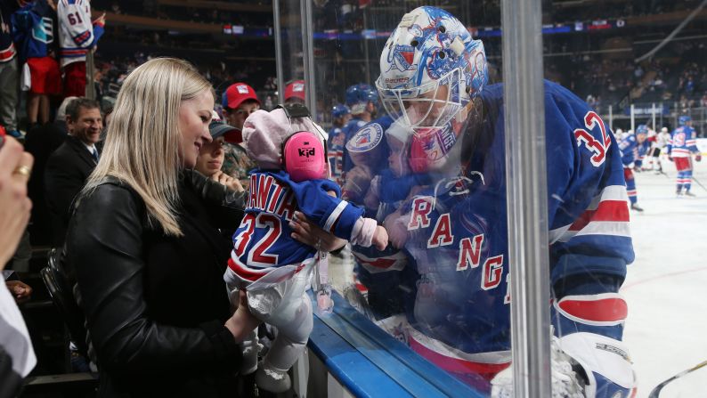 Antti Raanta, the backup goalie for the New York Rangers, greets his young daughter during pregame warm-ups on Thursday, May 4.