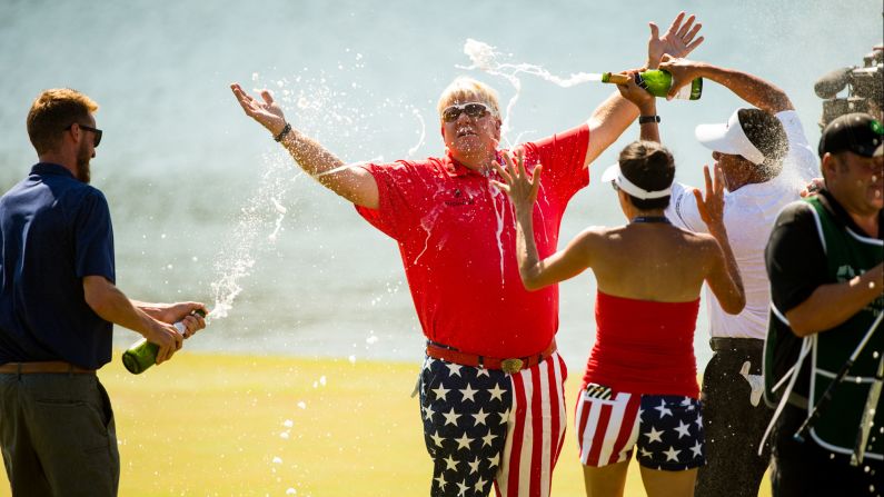 Legendary golfer John Daly is sprayed with champagne after winning a Champions tour event in The Woodlands, Texas, on Sunday, May 7. It was his first tournament win in 13 years. 