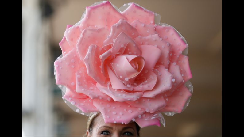 A woman wears a fancy hat before the Kentucky Derby on Saturday, May 7. <a href="index.php?page=&url=http%3A%2F%2Fwww.cnn.com%2F2017%2F05%2F06%2Fstyle%2Fgallery%2Fkentucky-derby-hats-2017%2Findex.html" target="_blank">See more of this year's Derby hats</a>
