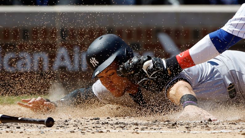 New York Yankees slugger Aaron Judge is tagged out by Chicago Cubs catcher Willson Contreras on Friday, May 5. Judge is off to<a href="index.php?page=&url=http%3A%2F%2Fwww.upi.com%2FSports_News%2FMLB%2F2017%2F05%2F03%2FAaron-Judge-continues-hot-streak-with-two-home-runs-as-New-York-Yankees-beat-Toronto-Blue-Jays%2F8681493823216%2F" target="_blank" target="_blank"> a hot start,</a> leading the majors in home runs as of Monday, May 8.