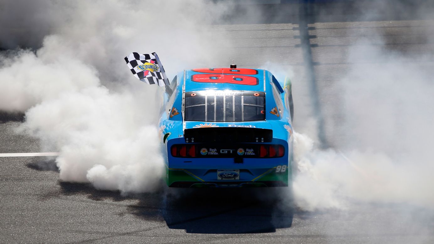 NASCAR driver Aric Almirola celebrates with a burnout after winning the Xfinity Series race in Talladega, Alabama, on Saturday, May 6. 