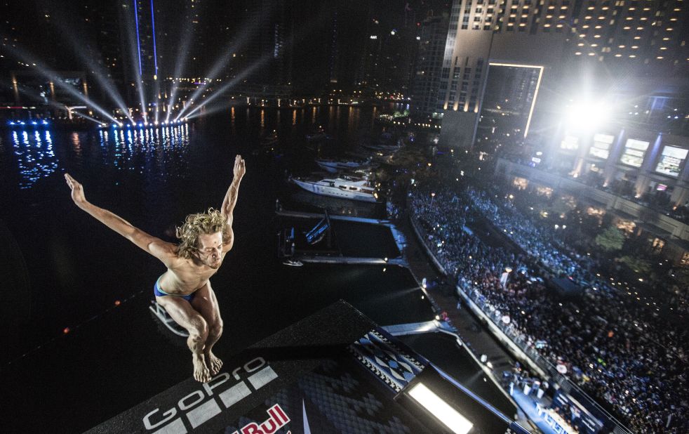 Requiring nerves of steel, the Red Bull Cliff Diving series showcases an elite set of the world's best super-high divers. In October 2016 the series stopped off at the Dubai Marina Pier. Pictured is Gary Hunt of the UK taking a leap off the 89 feet platform.<br />