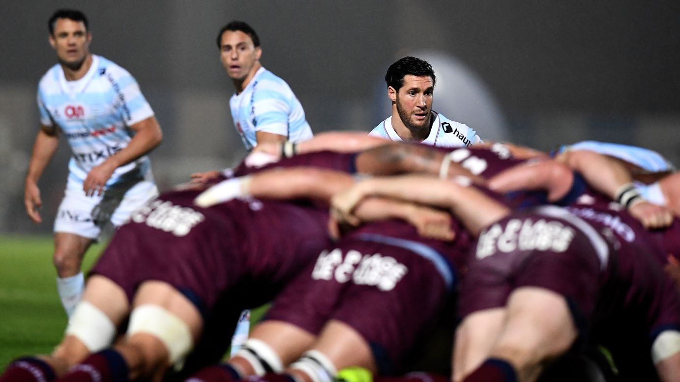 Rugby players from Racing 92 watch their teammates scrum with Bordeaux-Begles during a French league match in Colombes on Saturday, May 6.