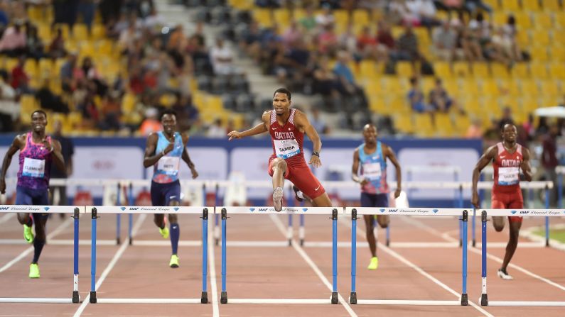 Qatar's Abderrahman Samba leads the pack on his way to winning the 400-meter hurdles at the Diamond League meet in Doha, Qatar, on Friday, May 5.