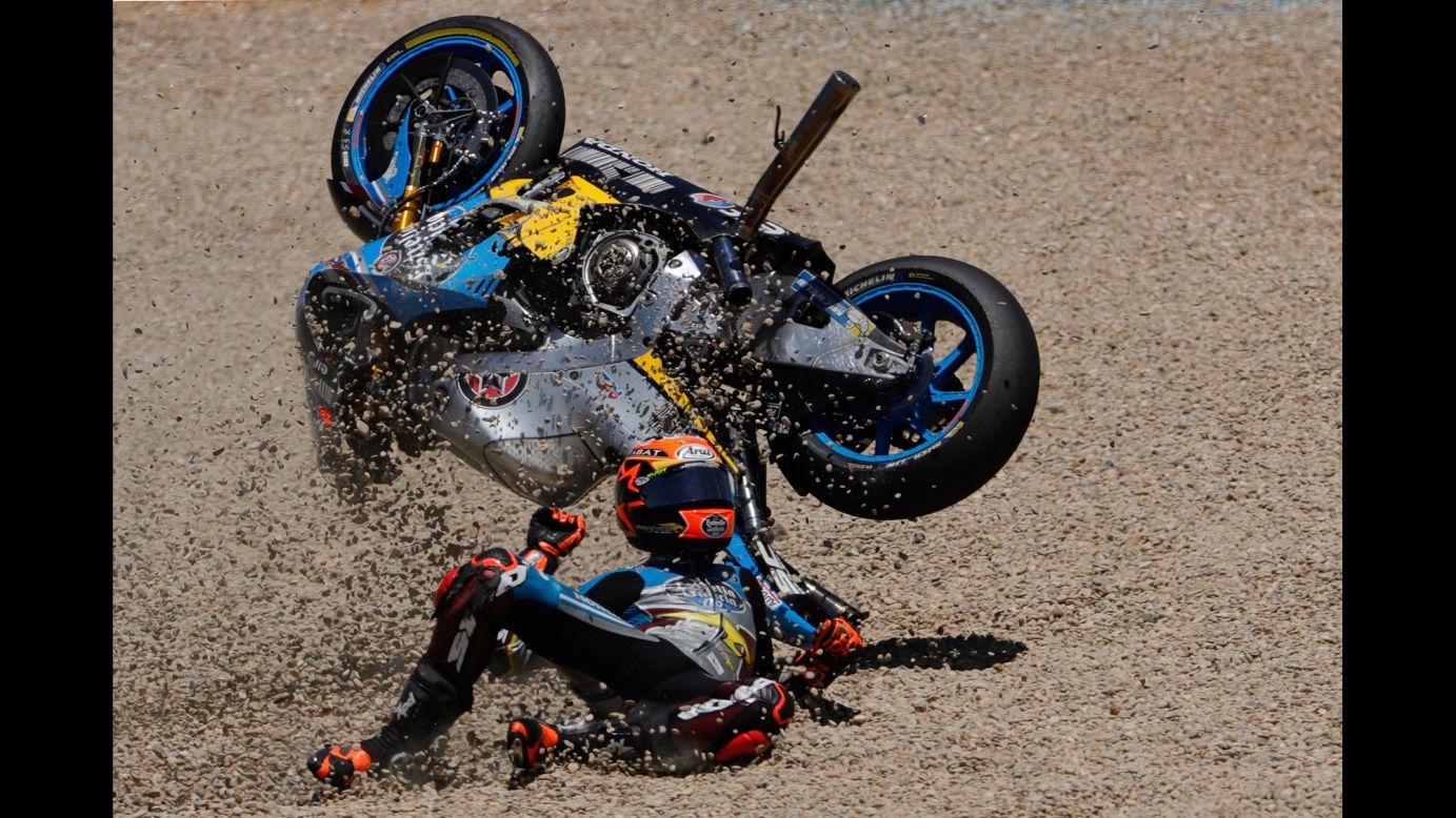 MotoGP rider Tito Rabat falls from his bike during the Spanish Grand Prix on Sunday, May 7.