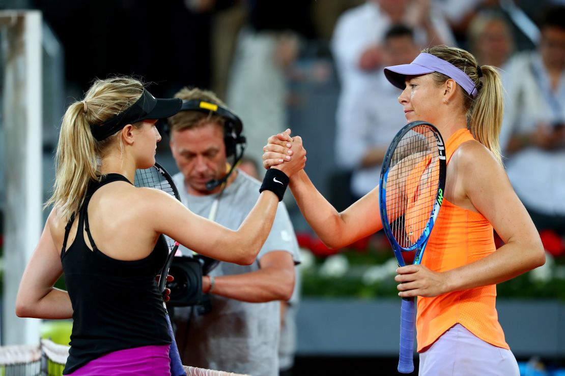 Sharapova shakes hands with Bouchard after losing to the Canadian in the second round of the Madrid Open.