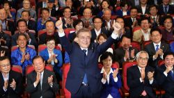 South Korean presidential candidate Moon Jae-in of the Democratic Party of Korea reacts after a television report on an exit poll of the new president at the party's auditorium in the National assembly on May 9, 2017 in Seoul, South Korea.