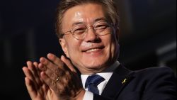 South Korean President-elect Moon Jae-in, of the Democratic Party of Korea, celebrates with supporters at Gwanghwamun Square on May 9, 2017 in Seoul, South Korea. 