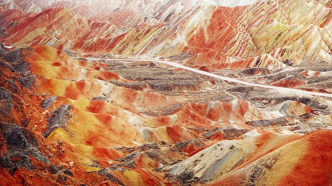The otherworldly landscape of the Rainbow Mountains is a result of oxidation and erosion. (Yeung Ming/Flickr/CC by 2.0)