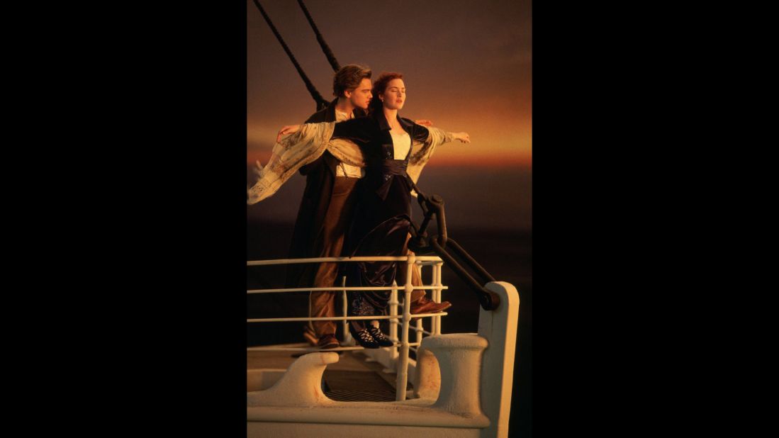 "Titanic" (1997) is one of the biggest blockbusters of all time, epitomized by this moment between a struggling artist Jack (Leonardo DiCaprio) and aristocrat Rose (Kate Winslet).