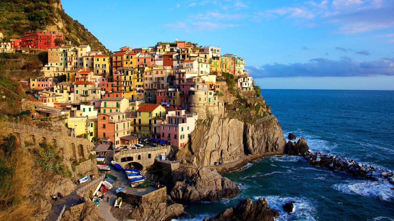 Cinque Terre's cliffside villages are even more magical during the golden hour. (Daniel Stockman/Flickr/CC by SA 2.0)