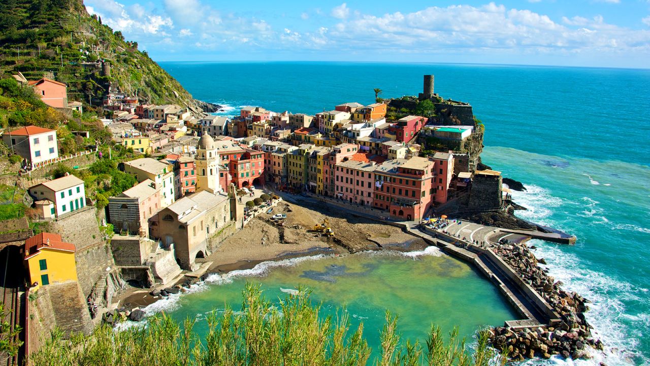 <strong>Cinque Terre, Italy: </strong>The five pastel villages of Cinque Terre trace their history to the early medieval times, hugging dramatic cliffs over the sea and crisscrossed by narrow paths that find ways across seemingly impregnable territory. (Daniel Stockman/Flickr/CC by SA 2.0)