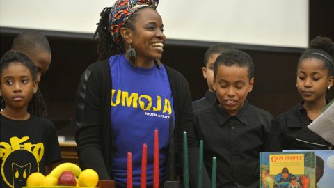 Hoffman and her students celebrate Kwanzaa at their suburban Boston school, the Helen Y. Davis Leadership Academy. 