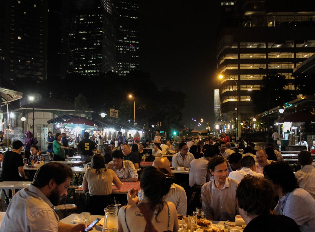 <strong>A communal BBQ: </strong>As the Tiger beer flows and satay sizzles, the Satay Street experience is like a family affair, where everyone feels at home.