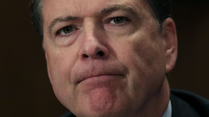 FBI Director James Comey testifies during a Senate Committee on Homeland Security and Government Affairs hearing on "Fifteen Years After 9/11: Threats to the Homeland," on Capitol Hill in Washington, DC on September 27, 2016.  / AFP / YURI GRIPAS        (Photo credit should read YURI GRIPAS/AFP/Getty Images)