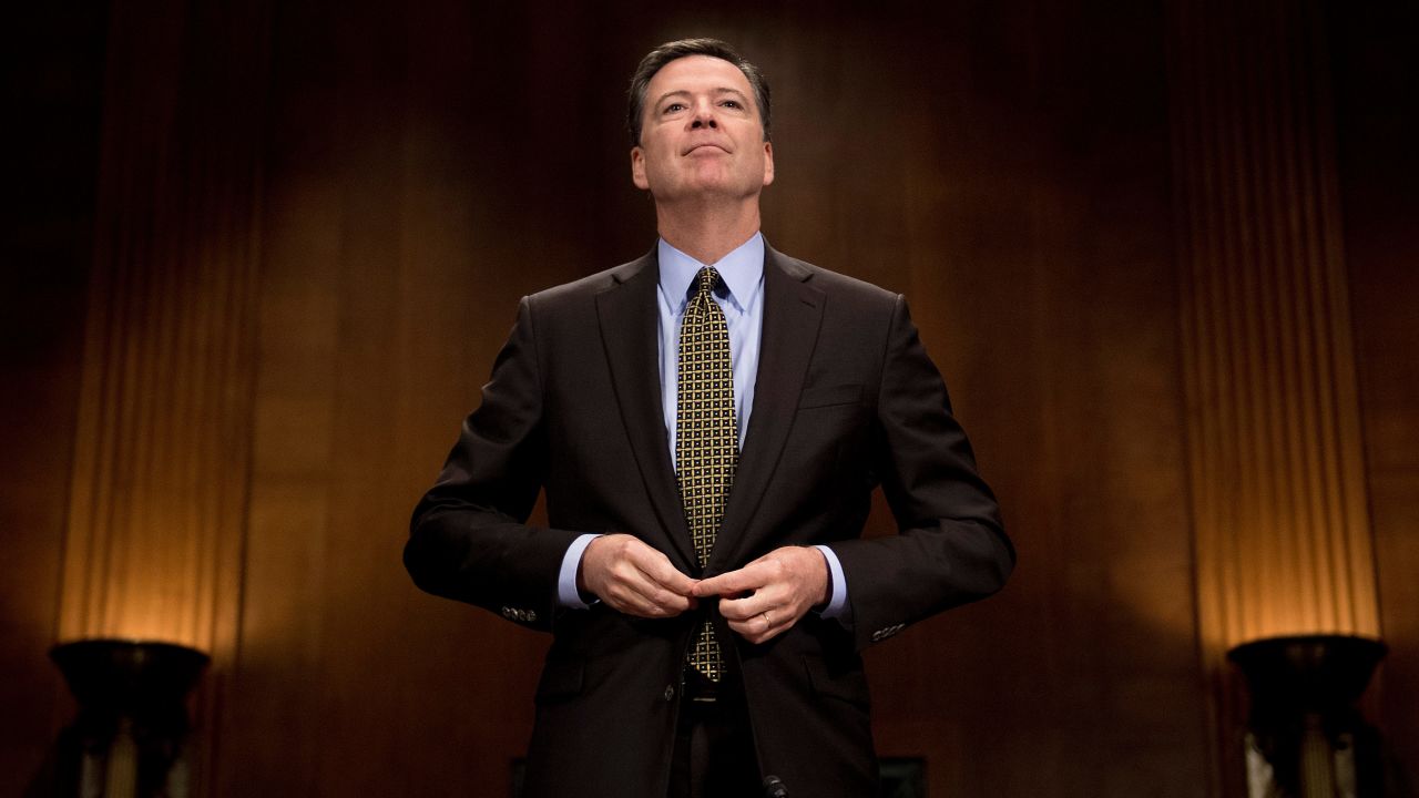 FBI Director James Comey prepares to testify before the Senate Judiciary Committee on Capitol Hill in Washington, DC, May 3, 2017. / AFP PHOTO / JIM WATSON        (Photo credit should read JIM WATSON/AFP/Getty Images)