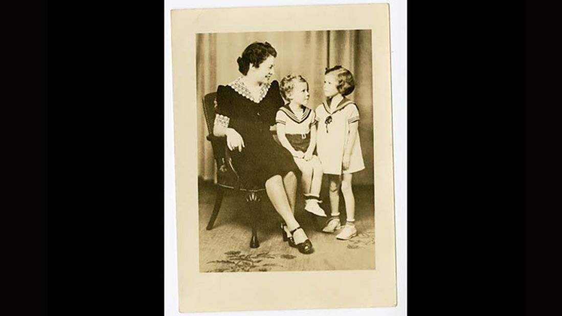 Kennedy was born in Sacramento, California, on July 23, 1936. In this photo, circa 1939, he sits between his mother, Gladys, and his sister, Nancy.