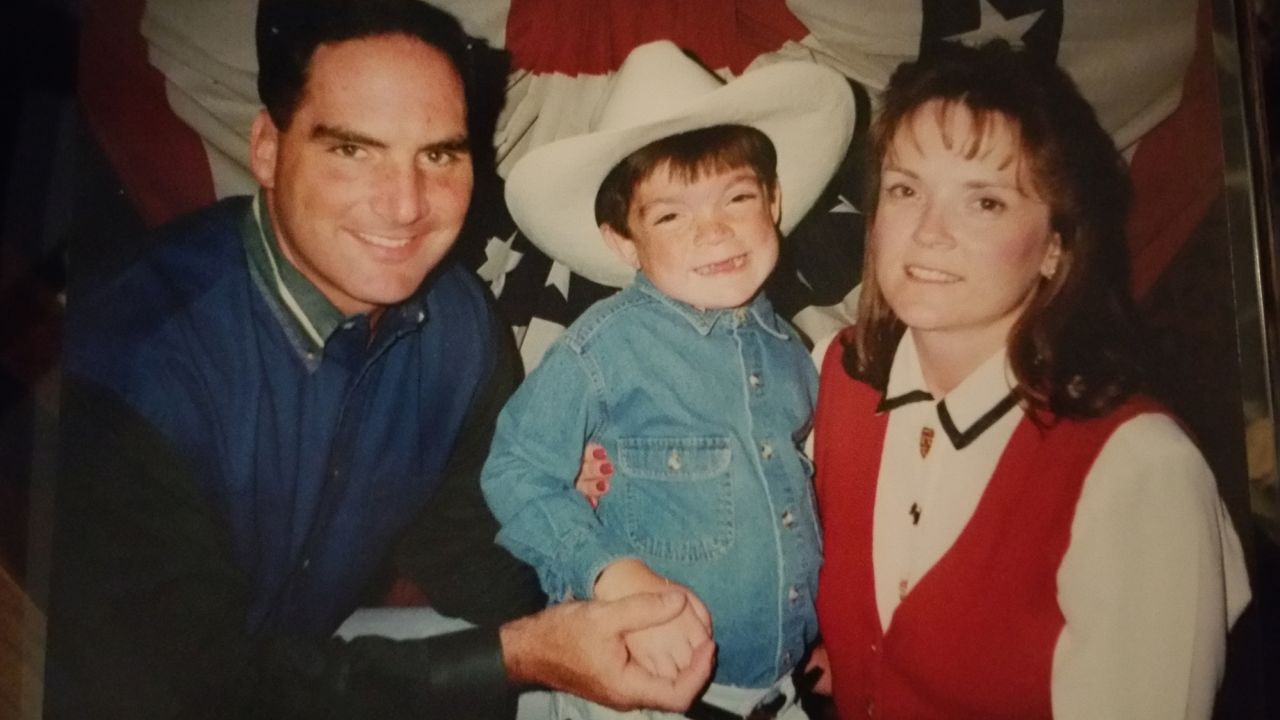 Ryan, 5, with his parents after one of the many fundraisers his father arranged for MPS research.