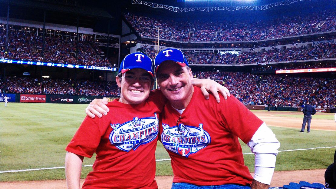 Ryan with his father at a Texas Rangers World Series game in 2010.