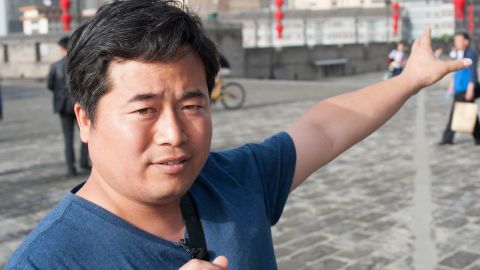 Michael Chang has been guiding tourists in Xi'an for eight years.