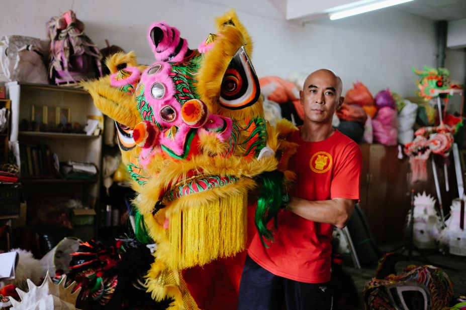 <strong>The lion maker: </strong>Teh Wing Liang, 42, has been making lion heads since he was 15 and says his style is modern. "I paint each one differently from the next. I make it up as I go along," he says.