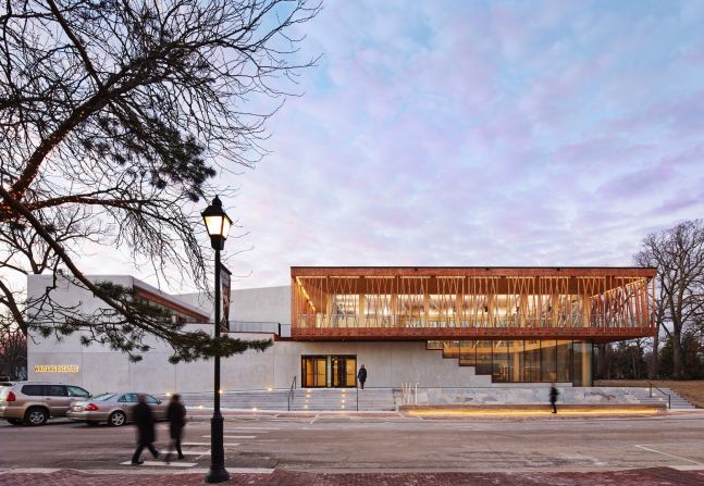 Built in 2016, Chicago-based Studio Gang Architects' design for the Writers Theatre in Glencoe, Illinois, uses timber trusses and a wooden lattice to support a second-floor gallery walk.