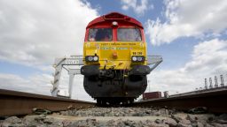 A freight train transporting containers laden with goods from the UK, departs from DP World London Gateway's rail freight depot in Corringham, east of London, on April 10, 2017, enroute to Yiwu in the eastern Chinese province of Zhejiang.
The first-ever freight train from Britain to China started its mammoth journey on Monday along a modern-day "Silk Road" trade route as Britain eyes new opportunities after it leaves the European Union. The 32-container train, around 600 metres (656 yards) long, left the vast London Gateway container port laden with whisky, soft drinks and baby products, bound for Yiwu on the east coast of China. / AFP PHOTO / Isabel Infantes        (Photo credit should read ISABEL INFANTES/AFP/Getty Images)