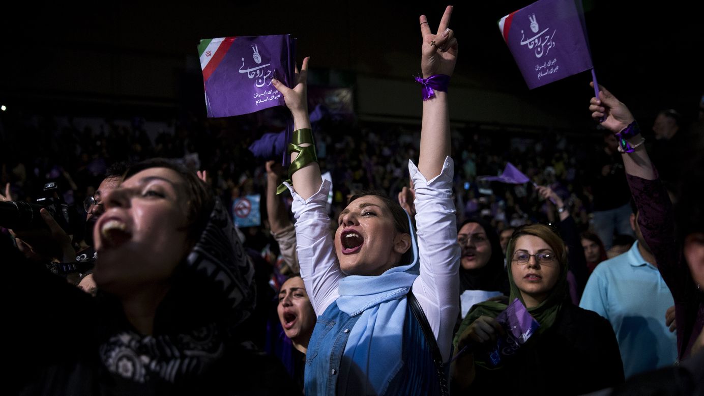 Supporters of Iranian President Hassan Rouhani attend a campaign rally in Tehran on Tuesday, May 9. The election will be held on May 19.