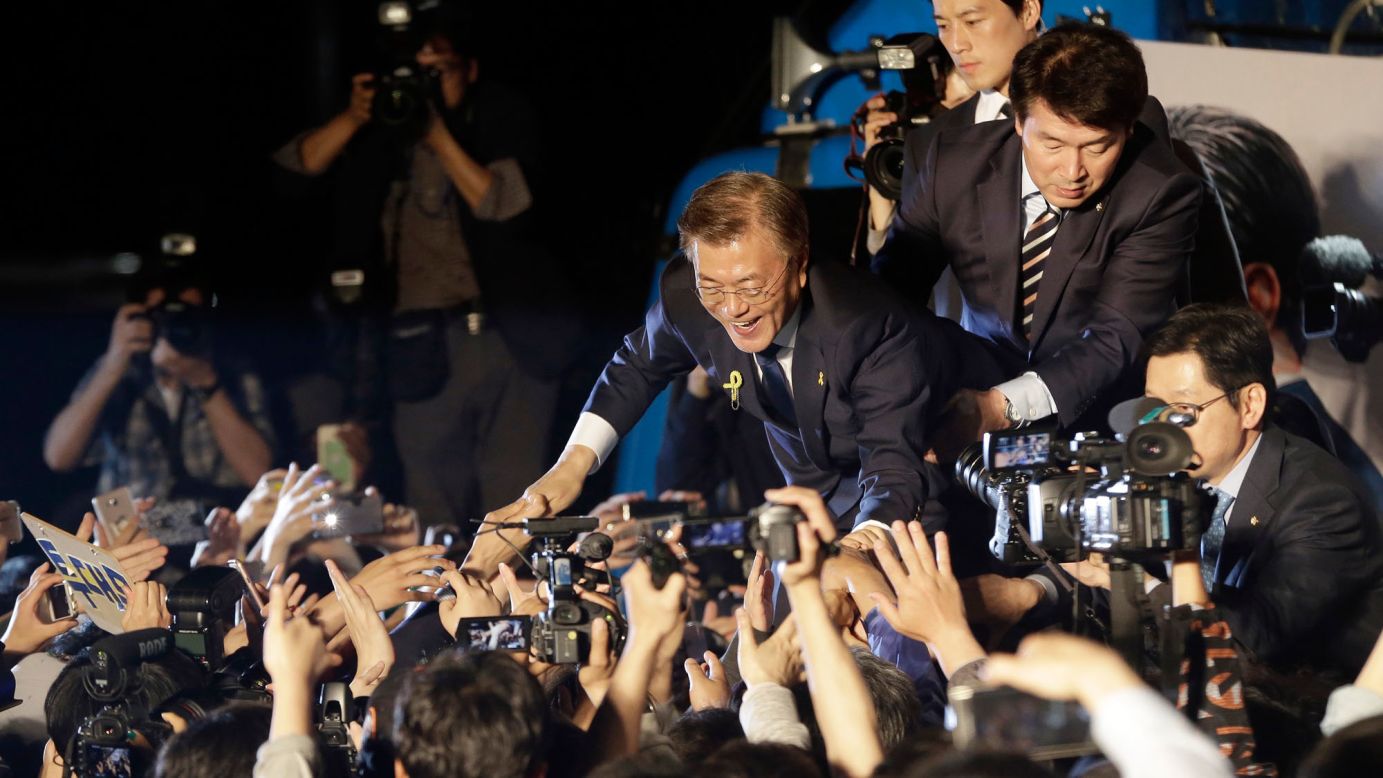 South Korean President-elect Moon Jae-in is greeted by supporters in Seoul on Wednesday, May 10. Moon, a liberal who favors a more open policy toward North Korea, <a href="http://www.cnn.com/2017/05/09/asia/south-korea-election/" target="_blank">was declared the winner</a> Wednesday by the country's National Election Commission. 