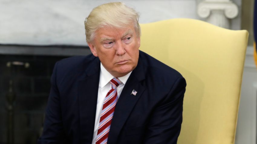 President Donald Trump talks to reporters during a meeting with Dr. Henry Kissinger, former Secretary of State and National Security Advisor under President Richard Nixon, in the Oval Office of the White House, Wednesday, May 10, 2017, in Washington. (AP Photo/Evan Vucci)