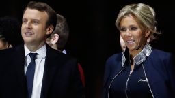 Supporters of French president-elect Emmanuel Macron (L) and his wife Brigitte Trogneux react at the Louvre Museum in Paris on May 7, 2017, after the second round of the French presidential election.
Emmanuel Macron was elected French president on May 7, 2017 in a resounding victory over far-right Front National (FN - National Front) rival after a deeply divisive campaign. / AFP PHOTO / Patrick KOVARIK        (Photo credit should read PATRICK KOVARIK/AFP/Getty Images)