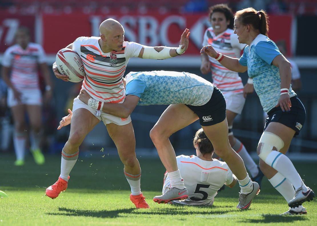 Fisher tries to hand off a Russian tackler in the last round of the HSBC Women's Sevens World Series