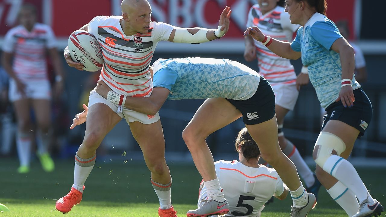 Fisher tries to hand off a Russian tackler in the last round of the HSBC Women's Sevens World Series