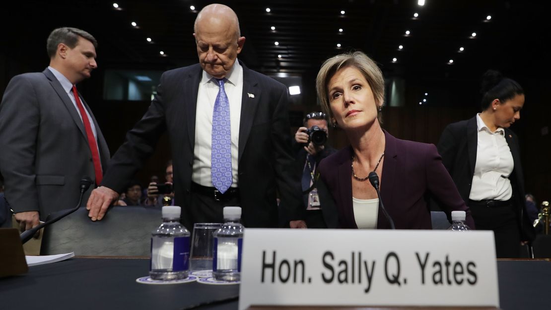 Former Director of National Intelligence James Clapper (2nd L) and former acting U.S. Attorney General Sally Yates arrive before testifying to the Senate Judiciary Committee's Subcommittee on Crime and Terrorism in the Hart Senate Office Building on Capitol Hill May 8, 2017 in Washington, DC. 