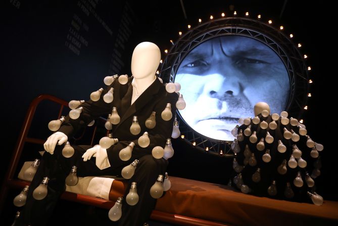 A display showing the mannequins dressed in a "lightbulb suits" on display in the exhibition from the "Delicate Sound of Thunder" album.