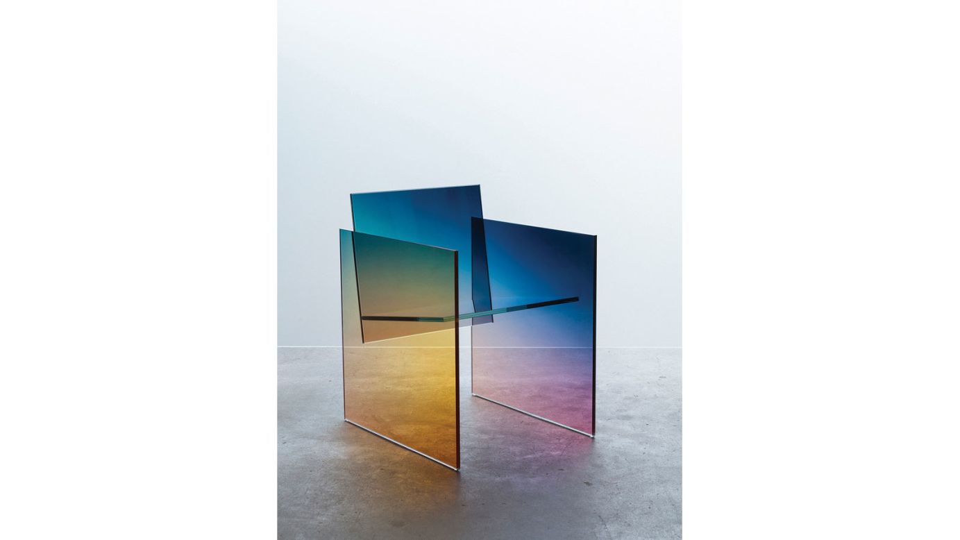 "Separately, ombre and glass are both huge trends in design. But somehow Latvian-born, Amsterdam-based designer <a href="http://www.germansermics.com/" target="_blank" target="_blank">Germans Ermics</a> combines the two to make something entirely fresh and beautiful — gradient mirrors, ombre shelves, and Kuramata-inspired chairs that darken from blue to the deepest purple. We've been tracking him for two years, and he's always surprising us." 