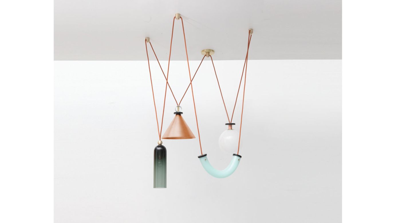 "We've been writing about or exhibiting <a href="http://www.ladiesandgentlemenstudio.com/" target="_blank" target="_blank">Ladies & Gentlemen</a>'s work since their debut in 2012 -- a collection of chairs and lights in leather, copper, and brass whose aesthetic was a harbinger of the warm minimalism we've been seeing over the past few years. All of their work stems from an exploration of basic shapes and elemental materials, as well as a fascination with balance, and each outing is more sophisticated than the last. They've recently been dipping a toe into the idea of bringing their aesthetic to a whole interiors experience, and we hope there's more of that to come."